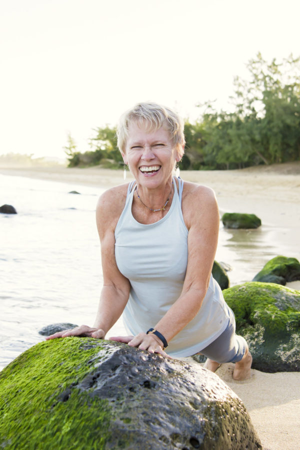 woman doing yoga push-ups